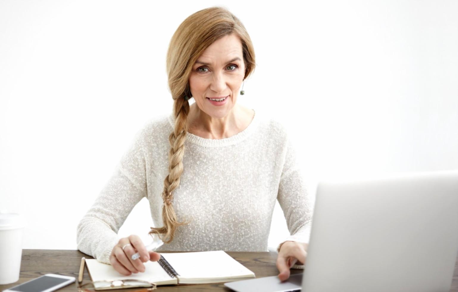 Financial planning workspace with organized documents and calculator